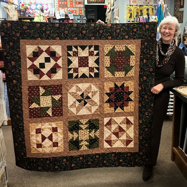 Margie with Margie's Magnificent Beginner's Quilt Sample
